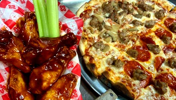 The Oshkosh fan favorites at Players Pizza & Pub restaurant and bar are the chicken wings and authentic brick oven pizzas